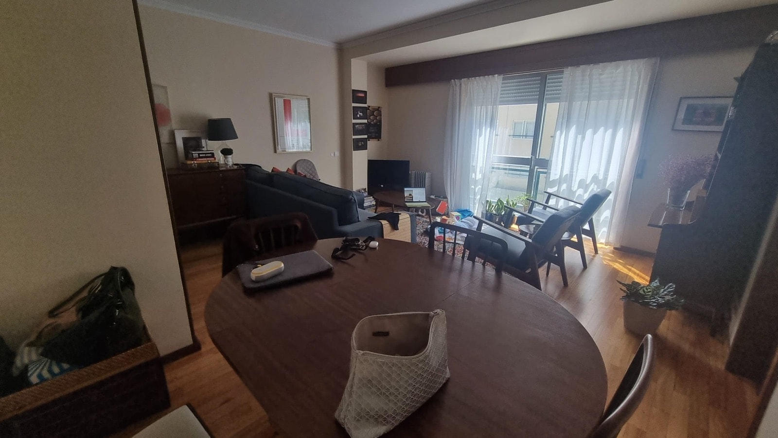 Lived-in living room with old furniture before MoveIn restyled it